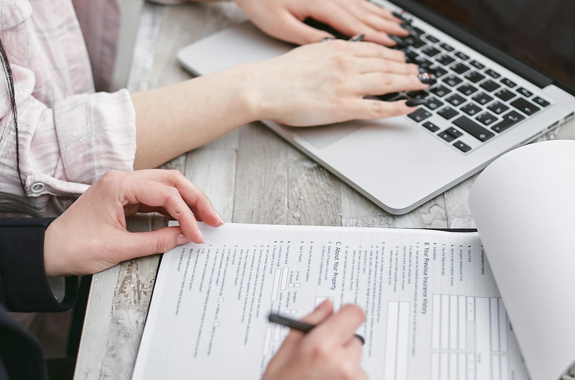 a-person-typing-on-laptop