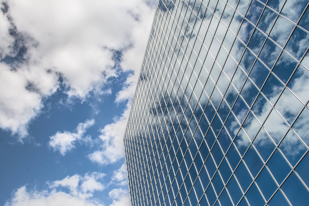 building-reflection-clouds-sky