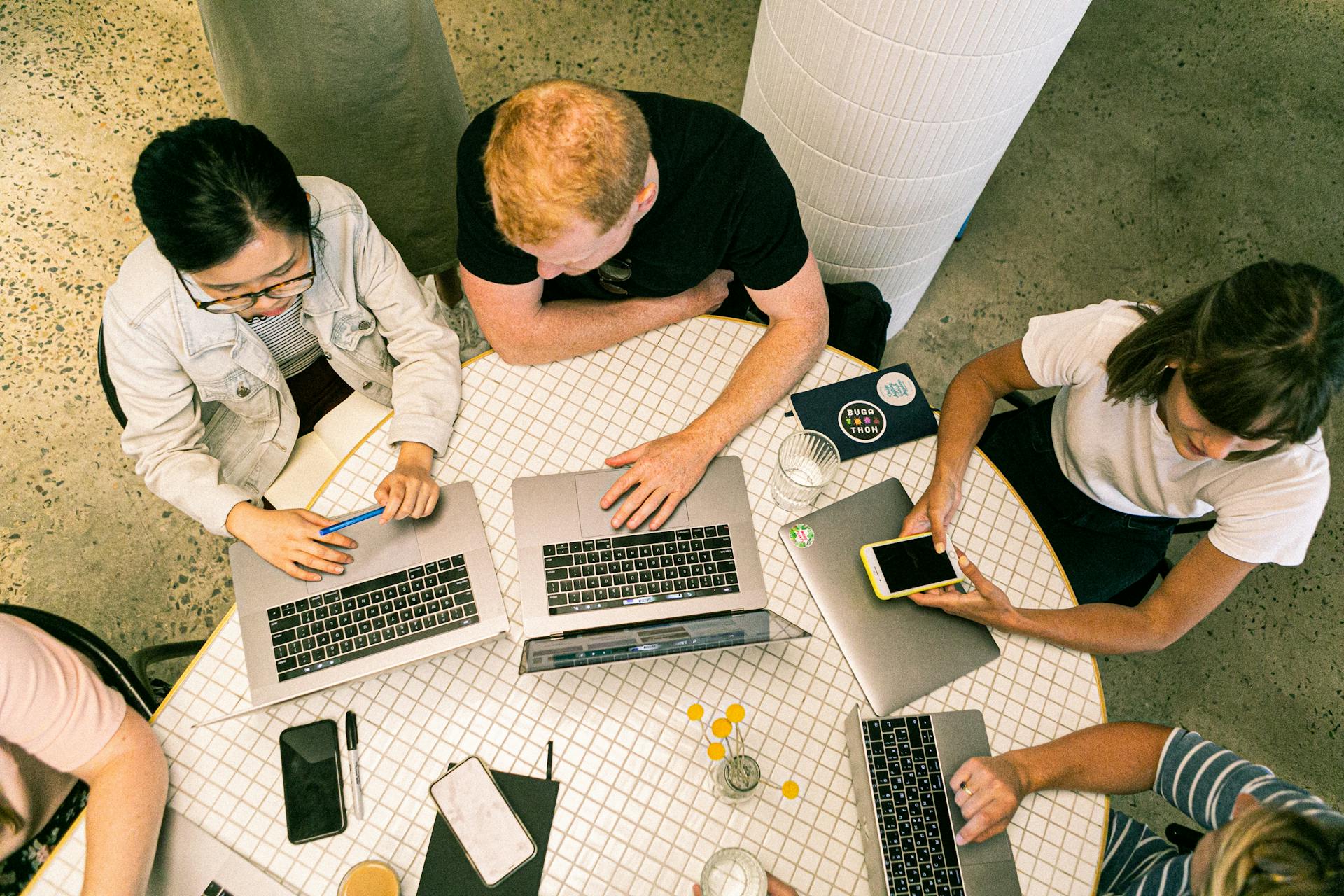 photo-of-people-using-laptops