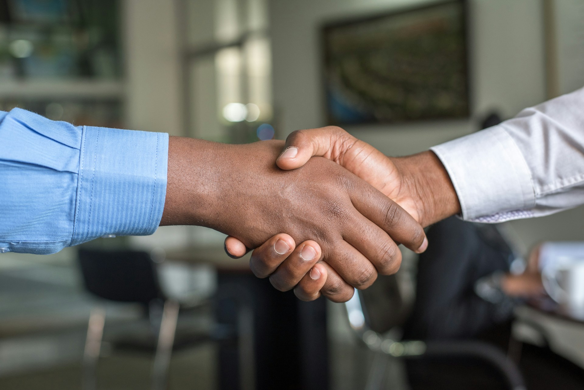 two-people-shaking-hands