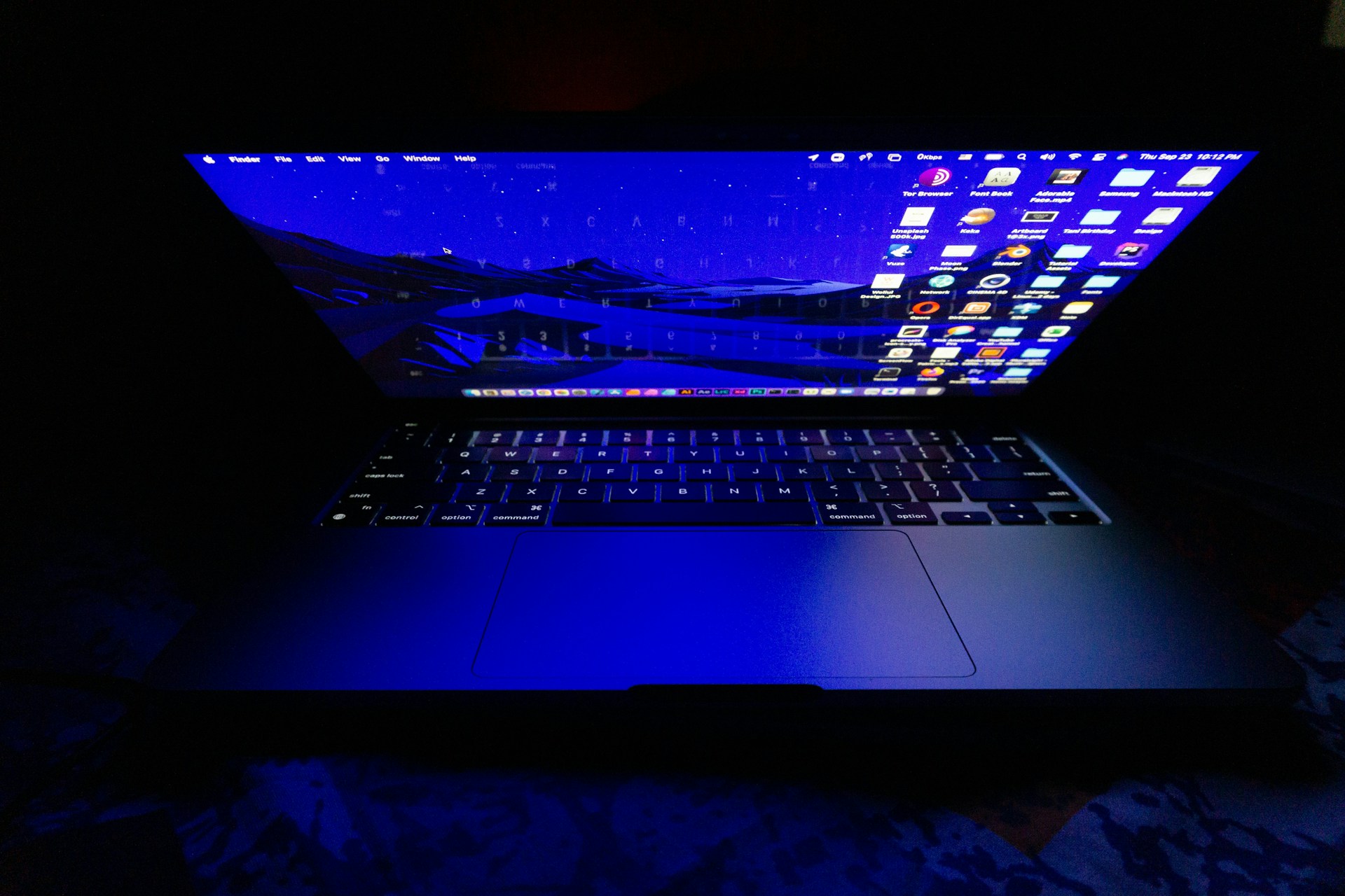 a-laptop-computer-lit-up-in-the-dark