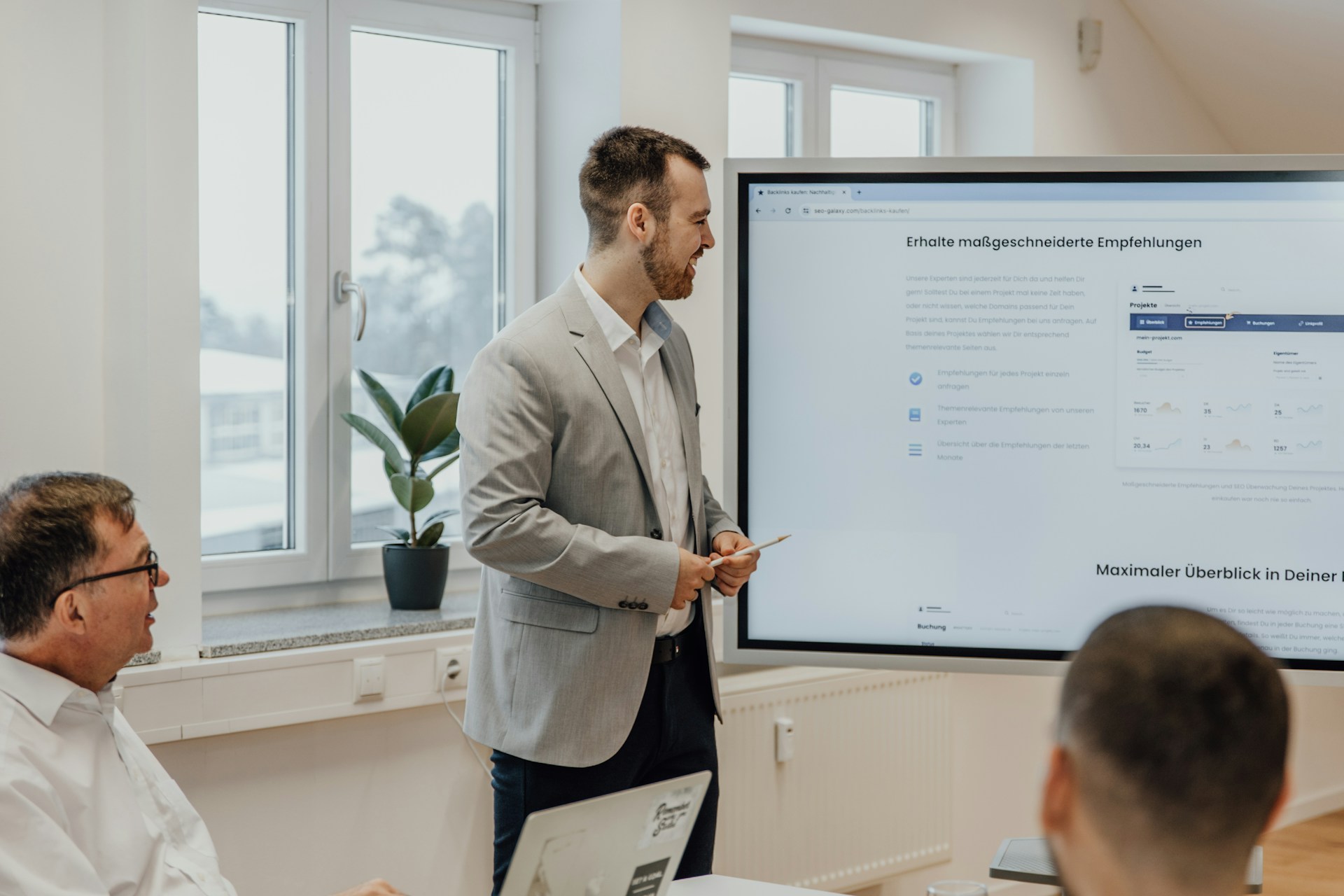 a-man-giving-a-presentation-to-a-group-of-people