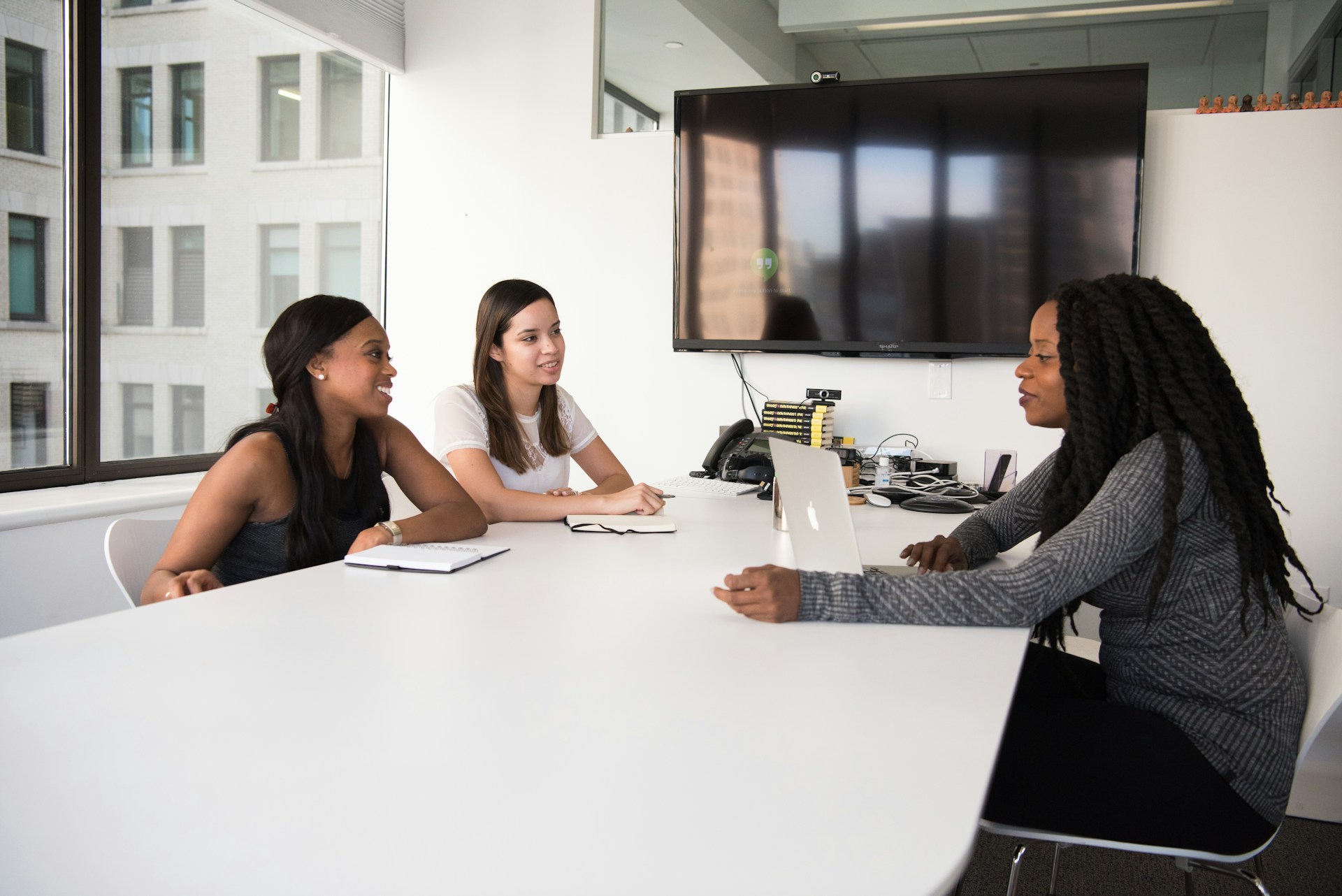 three-women-sitting-at-the-table