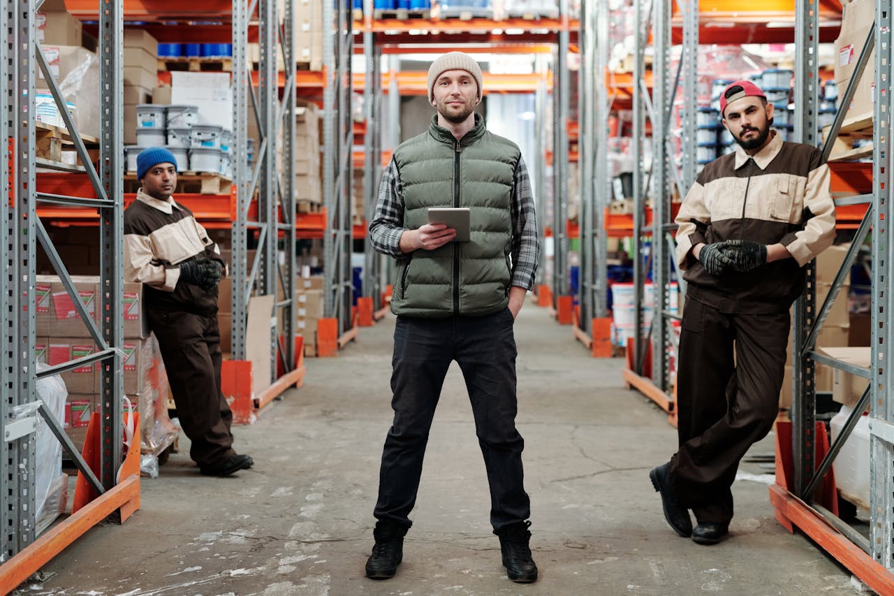 warehouse-workers-standing-in-corridor