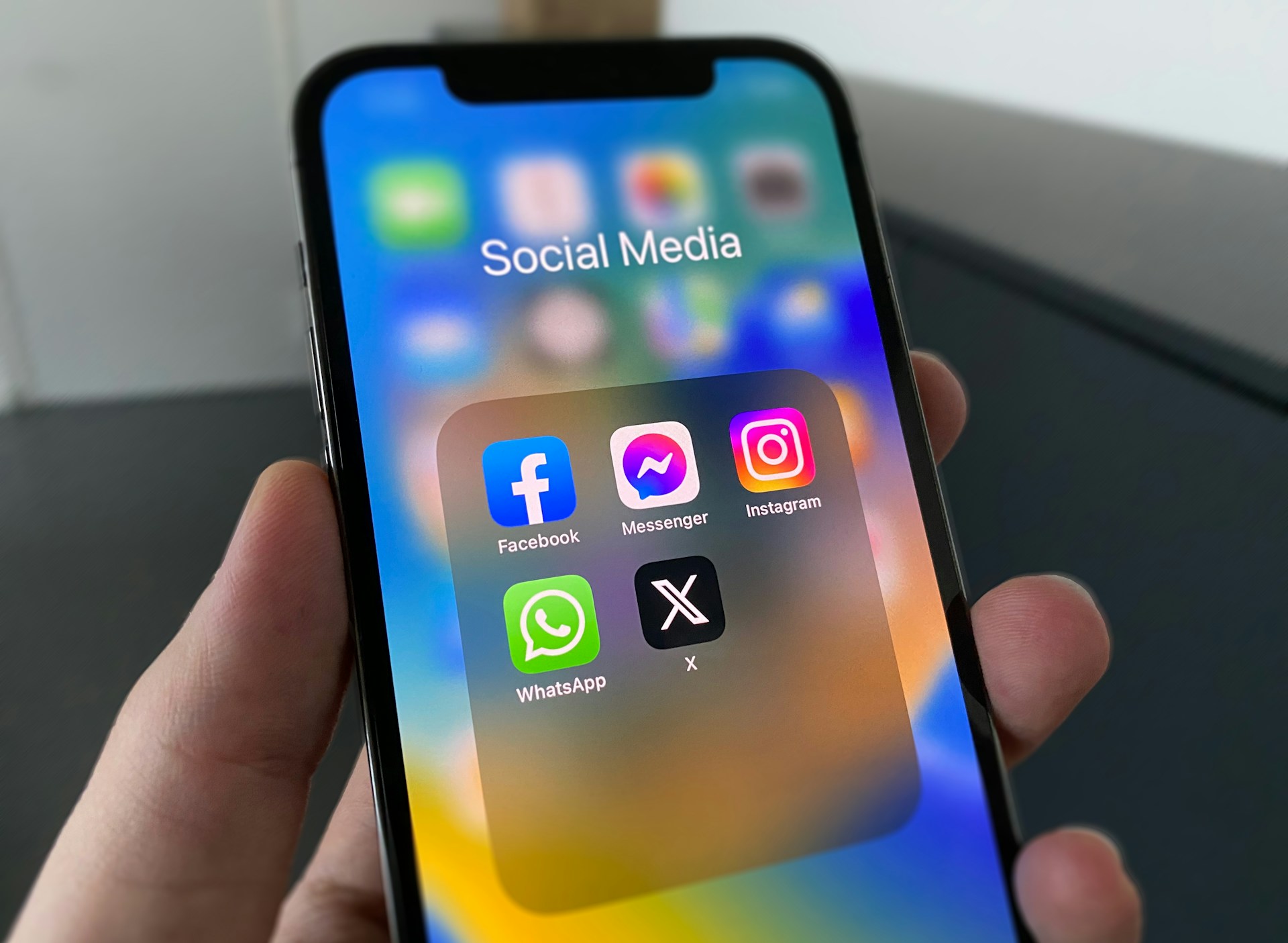 a-person-holding-a-cell-phone-with-social-media-on-the-screen
