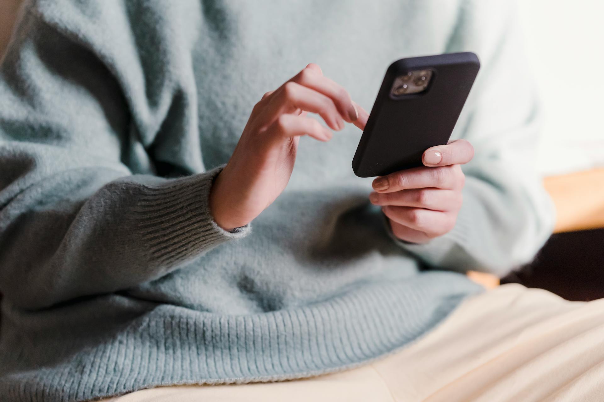 woman-surfing-internet-with-mobile-phone